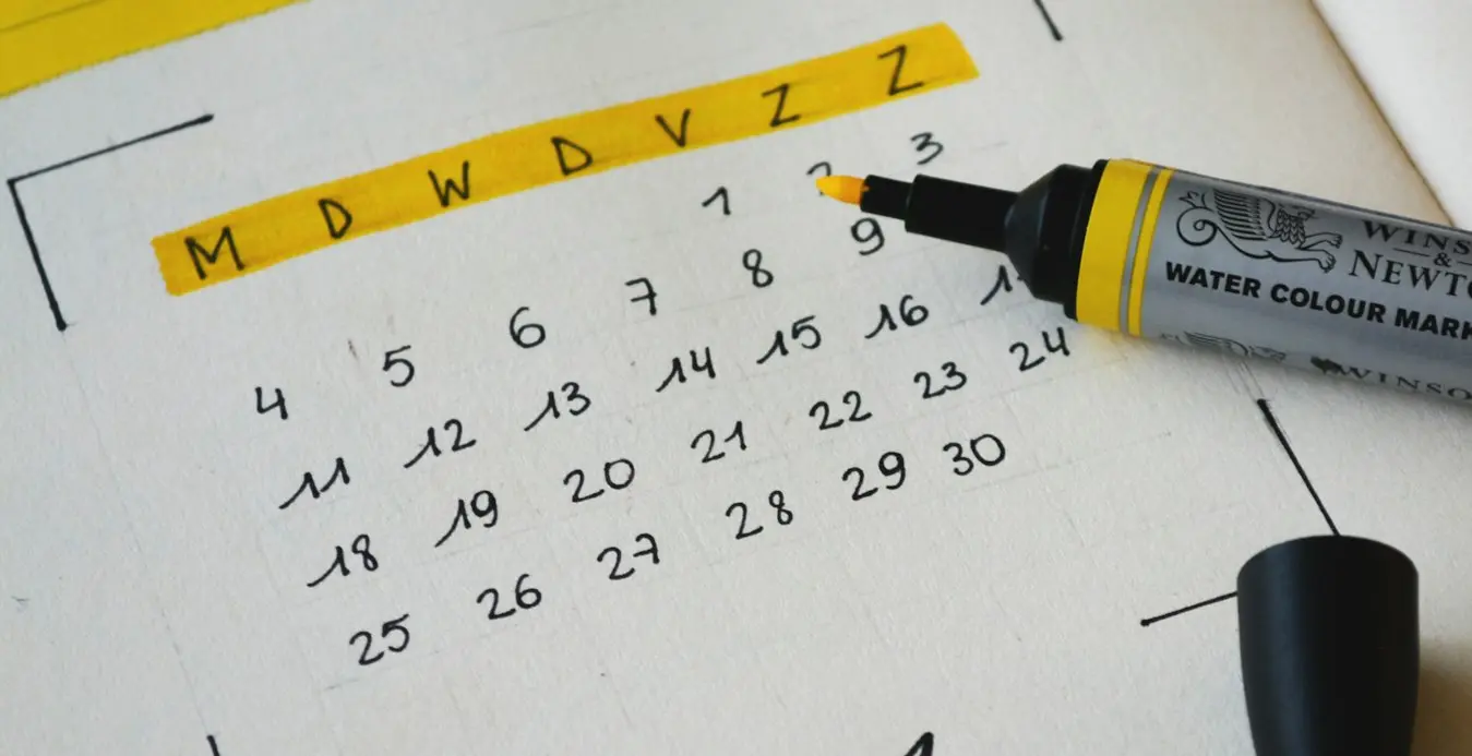 black marker on notebook